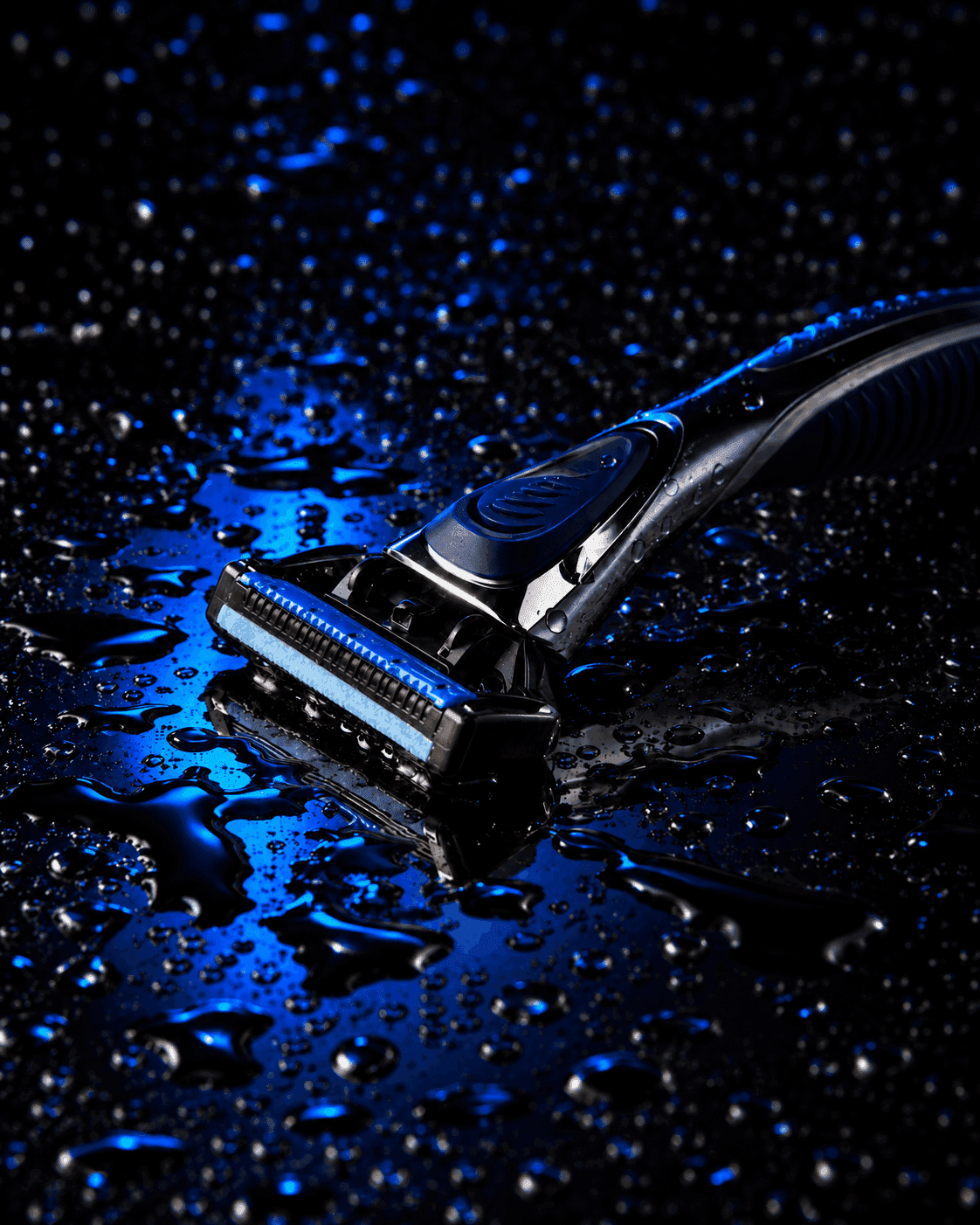 TEZAR razor on a blue water-covered surface