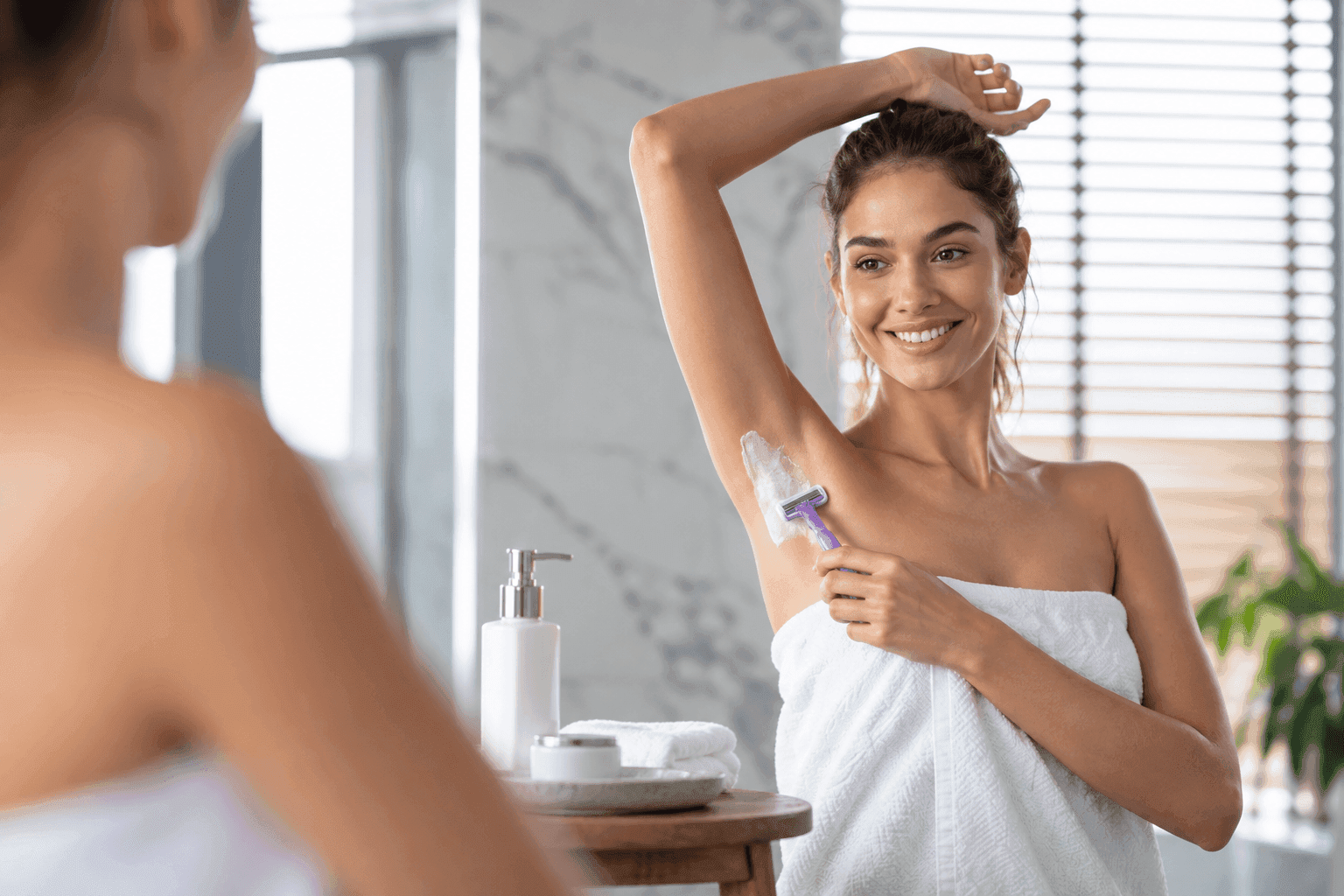 Woman using a TEZAR razor